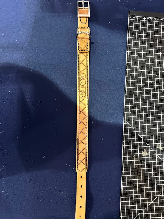 Custom hand-tooled leather dog collar with diamond basket weave pattern and personalized name stamp