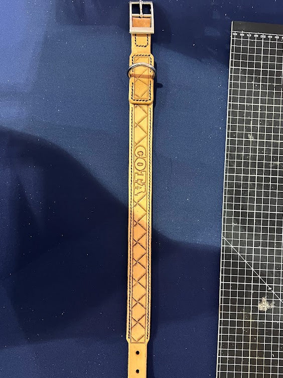 Custom hand-tooled leather dog collar with diamond basket weave pattern and personalized name stamp