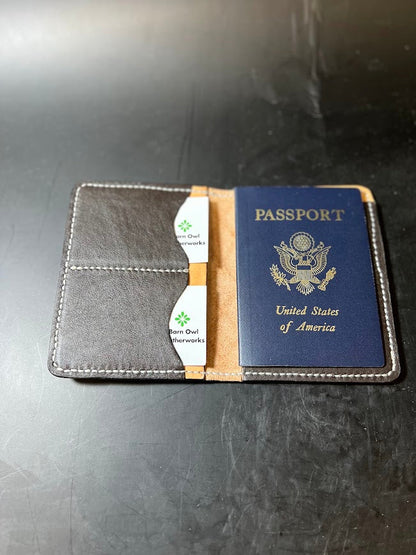 Custom two-tone leather passport cover open showing card slots and US passport