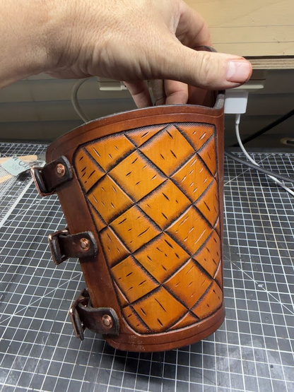 Side view showing diamond basketweave tooling detail and adjustable buckle straps